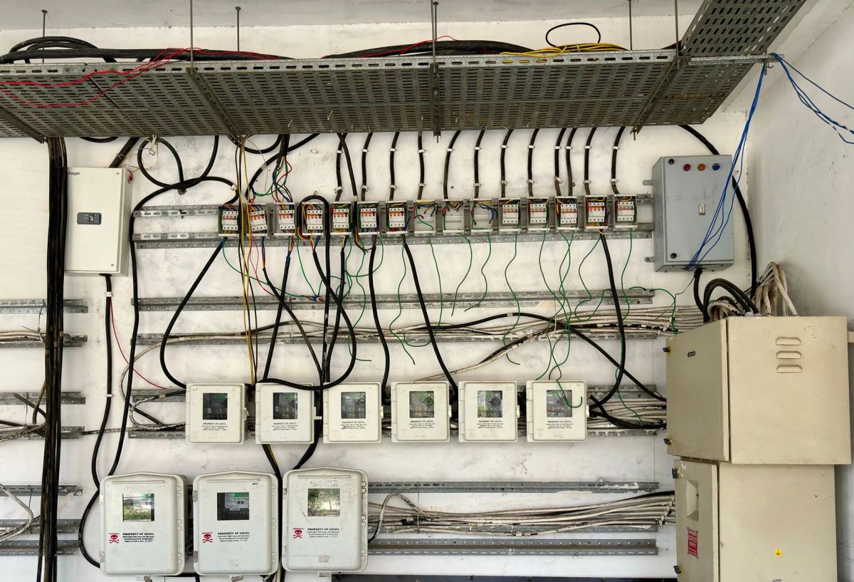 Electrician installing an EV charging station at a Murrieta commercial property